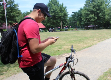 Randall Knight Jr. rides his bike about five miles daily and does so while playing the popular game app Pokemon Go. Michilea Patterson — Digital First Media